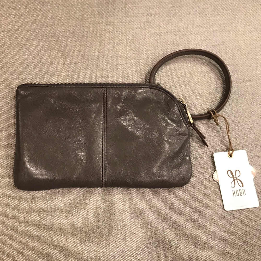 HOBO International grey leather wristlet.